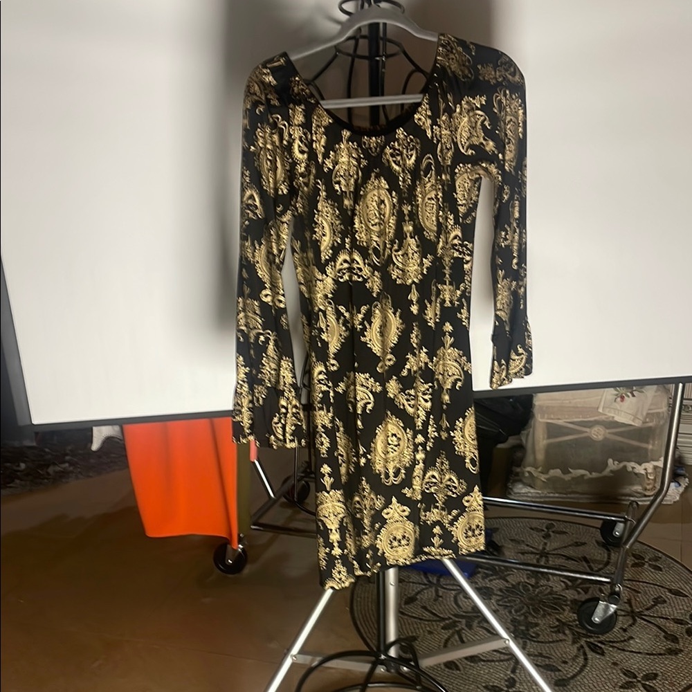 Elegant Black and Gold Patterned Dress
